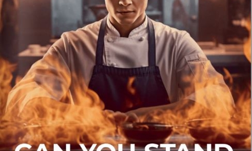 Picture of front cover of magazine showing a chef with some flames and text reading can you stand the heat